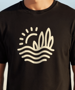 lose-up of abstract waves and sun print on black beach t-shirt