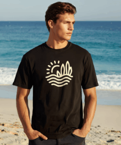 Person wearing black beach t-shirt with abstract waves design outdoors