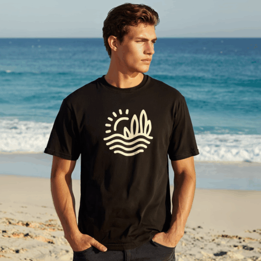 Person wearing black beach t-shirt with abstract waves design outdoors