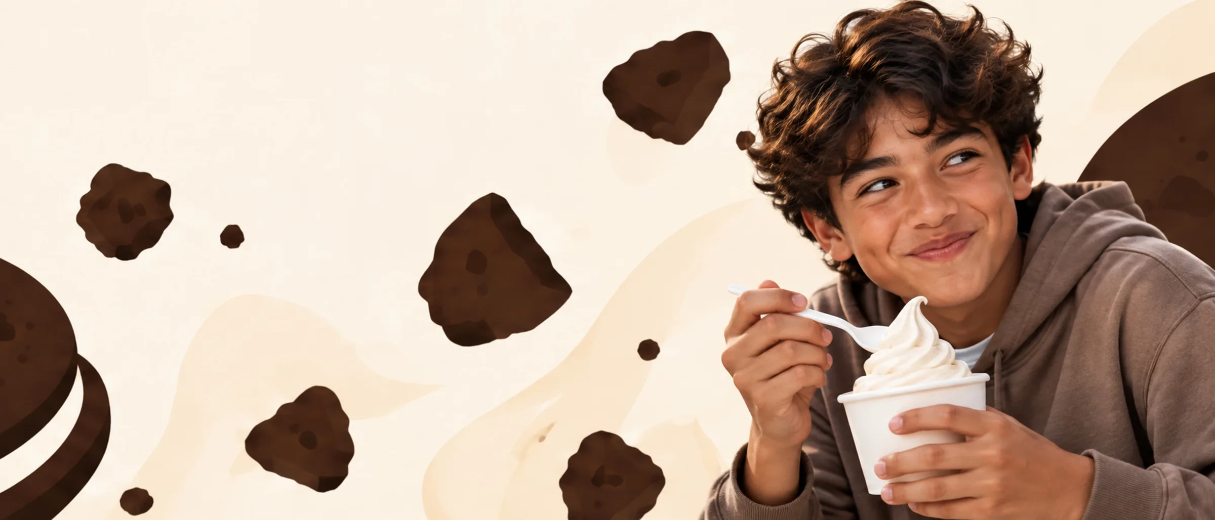 Someone enjoying a cup of Theo’s Cookies & Cream frozen yogurt