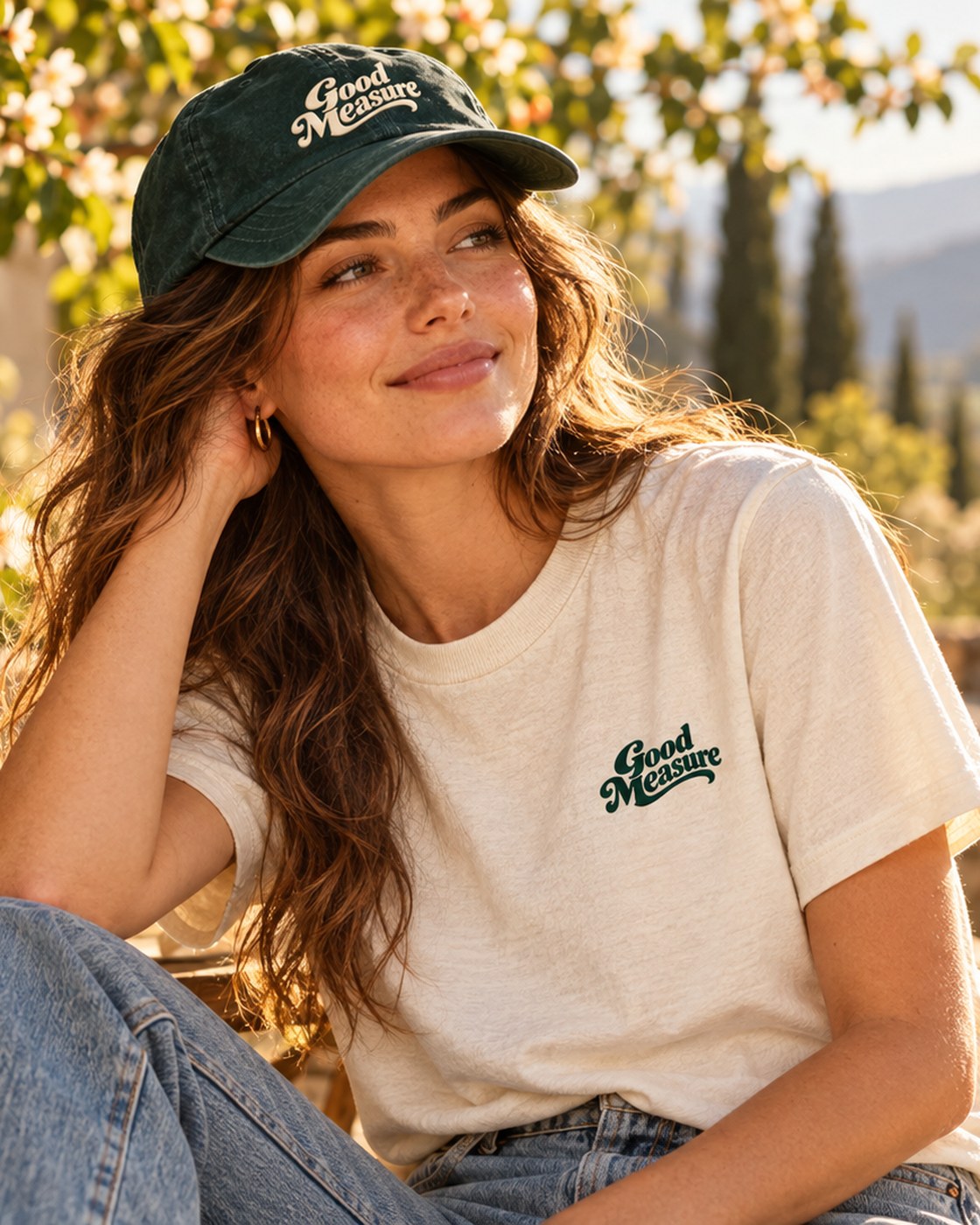 Script Cap: Washed pine cotton, unstructured, with the script embroidered in cream.