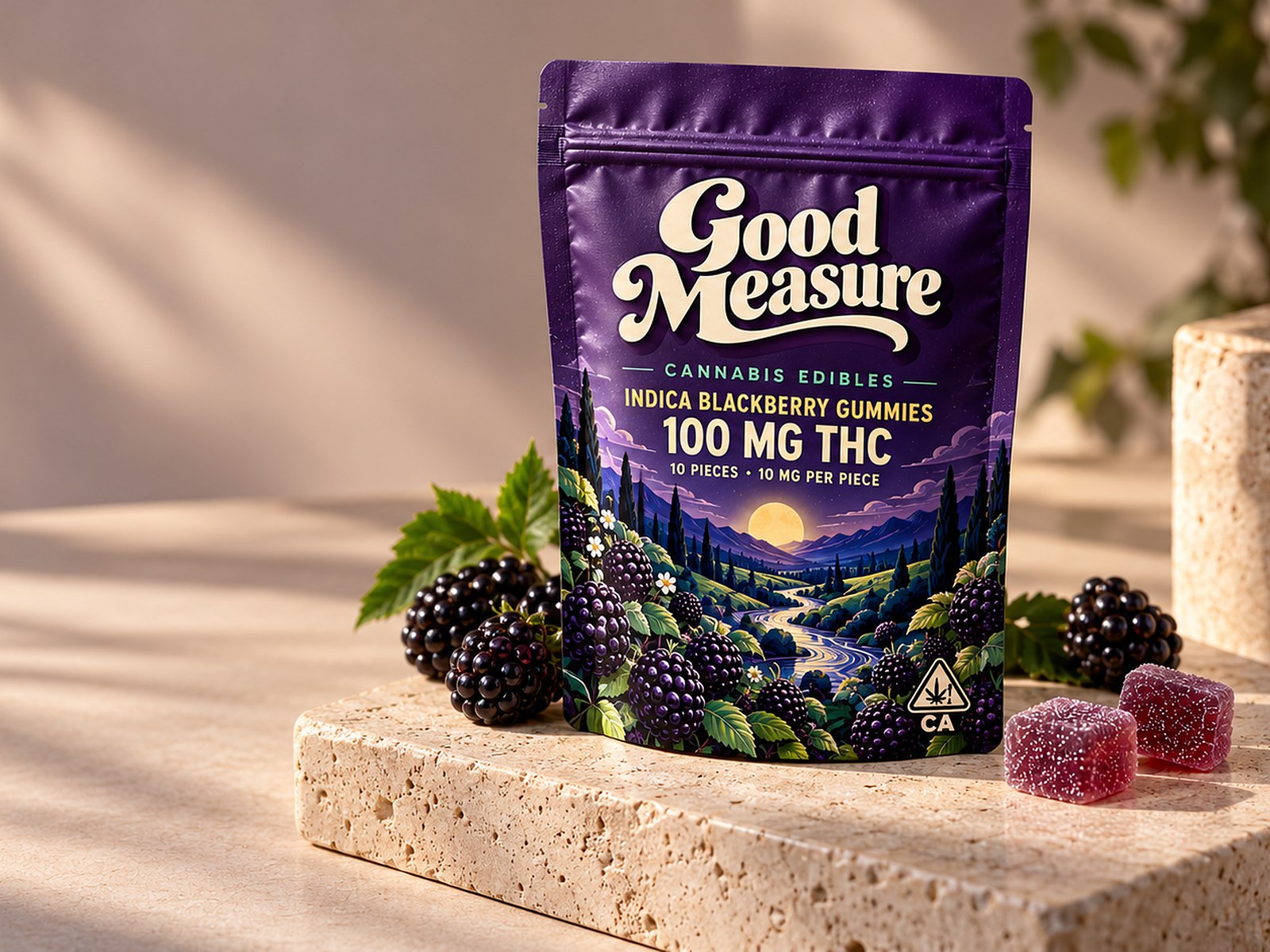 The blackberry pouch on a limestone block with blackberries and sugared gummies, its painted valley under a full moon