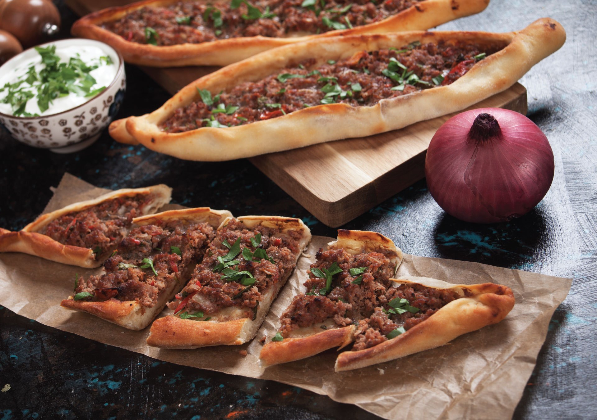 Turkish pide on a dark table