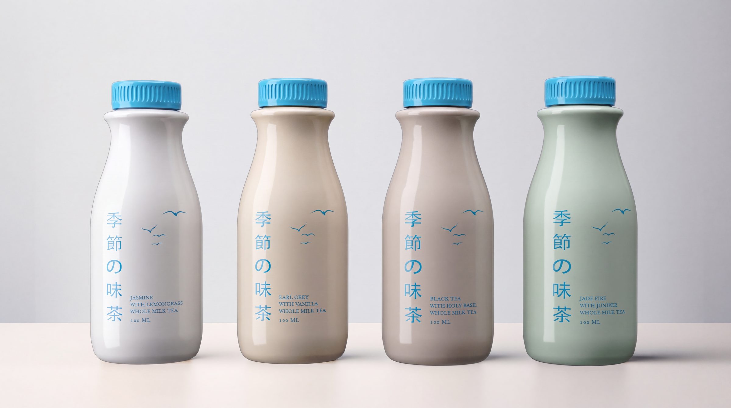 The four bottles in a row: milk white, ivory, taupe and sage, each with a sky-blue cap