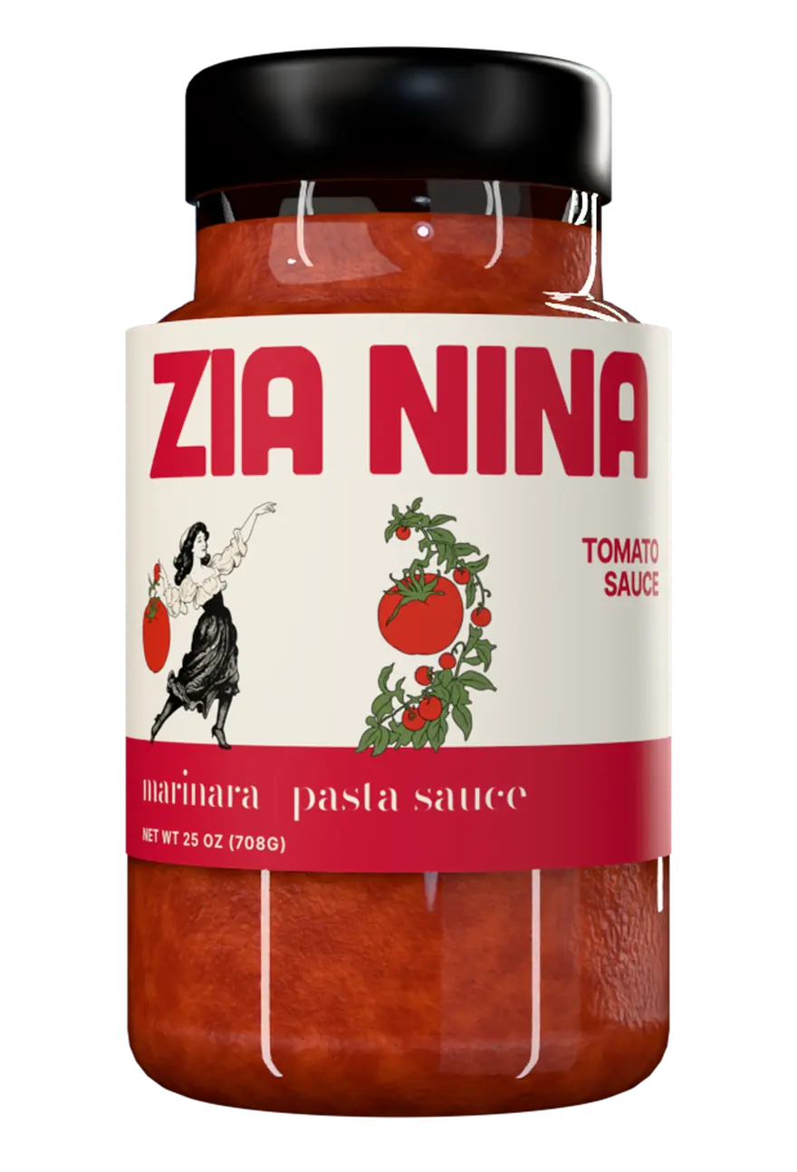 A jar of Zia Nina Marinara: cream label, red name, the dancing lady and the tomato vine, red band